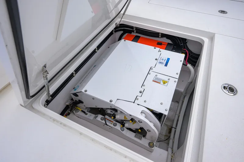 Slide: The Image of Engine compartment of 2021 Valhalla V-41 boat, showcasing advanced machinery and wiring. - 69
