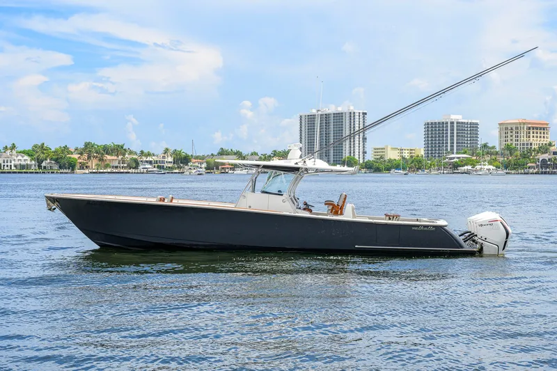 Slide: The Image of 2021 Valhalla V-41 boat on water with city skyline background. - 13