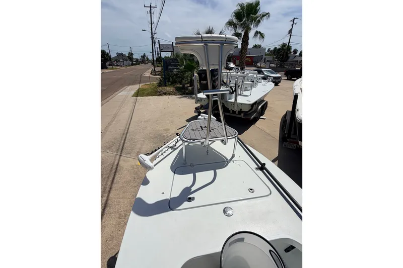 Slide: The Image of 2022 Beavertail Skiffs Mosquito 18' boat on trailer, parked outdoors. - 25