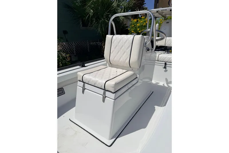 Slide: The Image of 2022 Beavertail Skiffs Mosquito 18' boat interior with white cushioned seating. - 7