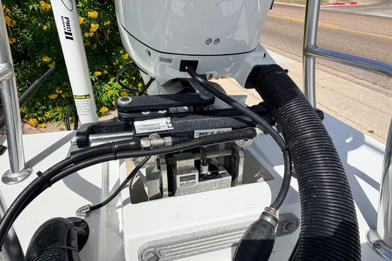 Slide: The Image of 2022 Beavertail Skiffs Mosquito 18' boat engine and hydraulic system detail. - 20