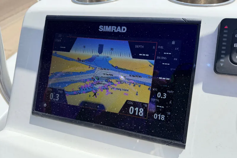 Slide: The Image of Simrad navigation display on 2022 Beavertail Skiffs Mosquito 18' boat, showing detailed marine map. - 13