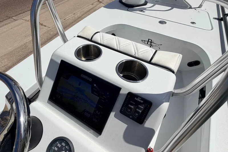 Slide: The Image of 2022 Beavertail Skiffs Mosquito 18' console with Simrad display and cup holders. - 14