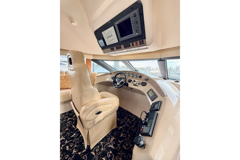 Slide: The Image of Interior helm of 2005 Carver 56 Voyager yacht with advanced navigation equipment. - 30