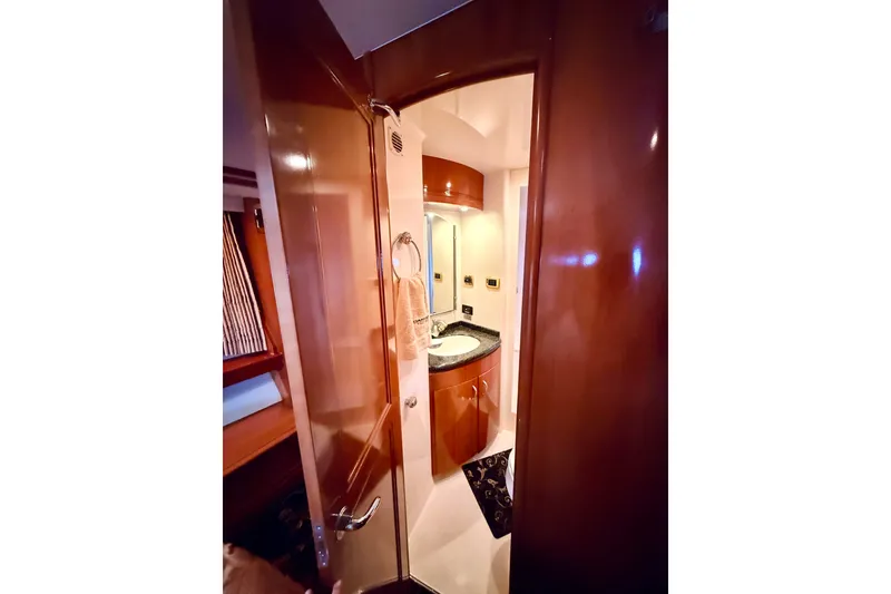 Slide: The Image of Luxurious bathroom interior of 2005 Carver 56 Voyager yacht with elegant wood finish. - 48