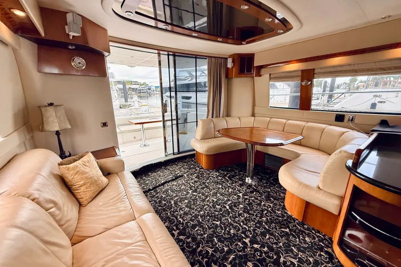 Slide: The Image of Luxurious interior of a 2005 Carver 56 Voyager yacht with elegant seating and decor. - 21
