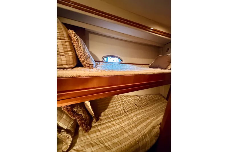 Slide: The Image of Interior of 2005 Carver 56 Voyager yacht with cozy bunk beds. - 52