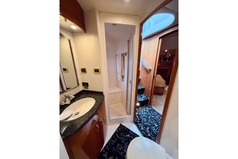 Slide: The Image of Luxurious bathroom in 2005 Carver 56 Voyager yacht with elegant fixtures and modern design. - 49