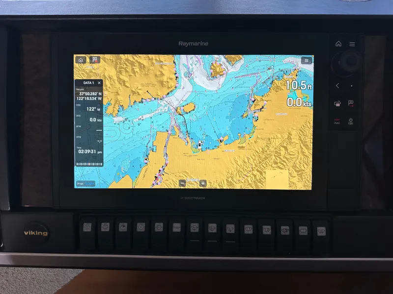 Slide: The Image of Navigation display on 2007 Viking Sport Cruiser showing nautical chart and data. - 22