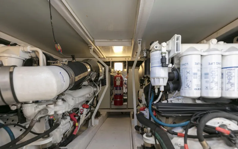 Slide: The Image of Engine room of a 2007 Viking Sport Cruiser, showcasing complex machinery and equipment. - 46