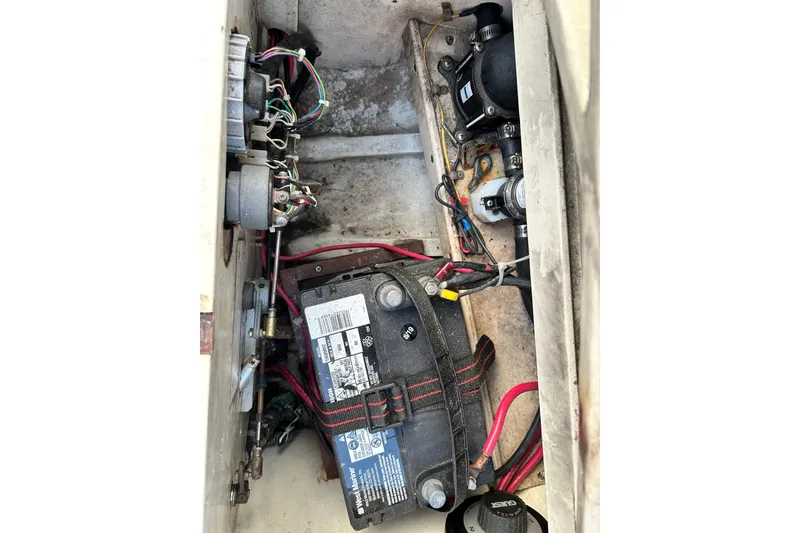Slide: The Image of Electrical components and battery inside a 1975 Halberg Rassey P-28 boat. - 48
