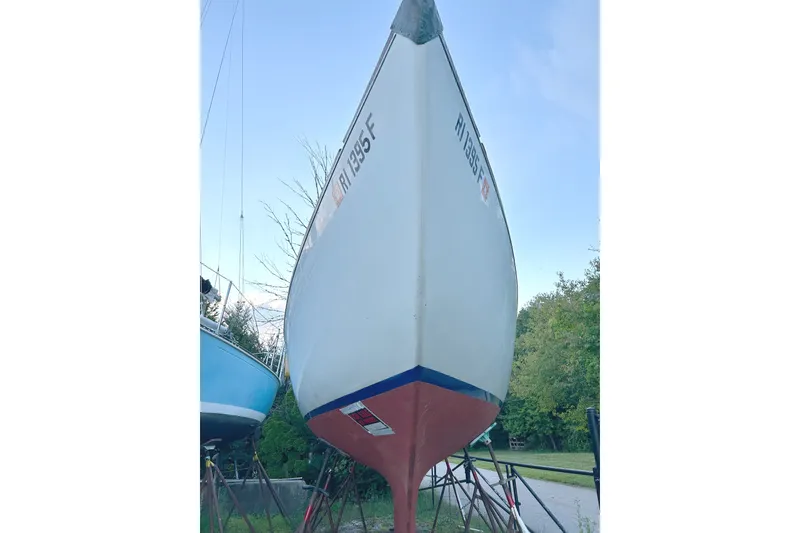 Slide: The Image of 1975 Halberg Rassey P-28 sailboat on stands, viewed from the bow. - 51