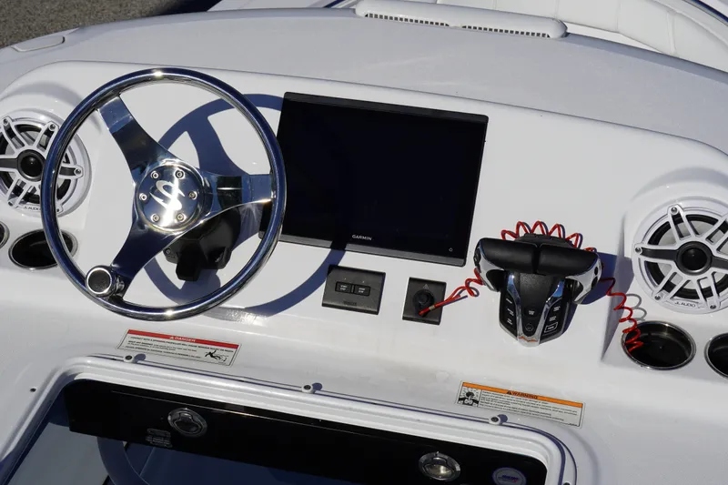 Slide: The Image of 2026 Sportsman Open 302 Center Console dashboard with steering wheel and controls. - 27