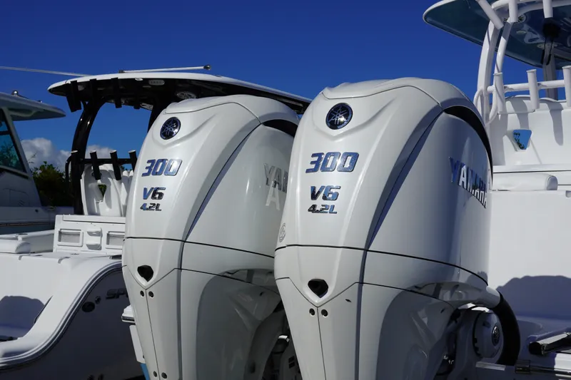 Slide: The Image of 2026 Sportsman Open 302 Center Console with twin Yamaha 300 V6 engines. - 11