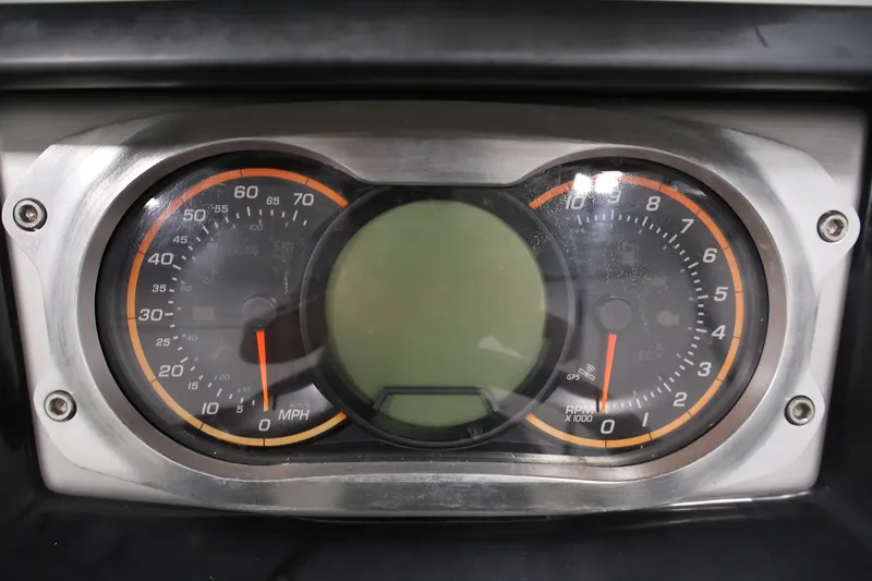 Slide: The Image of Dashboard of a 2016 Scarab 165 G with speedometer and tachometer gauges. - 20