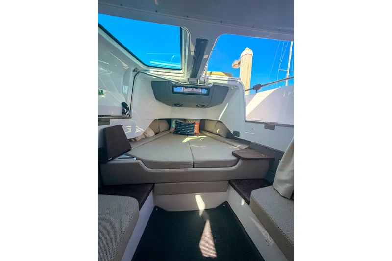 Slide: The Image of Interior of 2021 Axopar 37 XC Cross Cabin with cozy seating and skylight. - 26