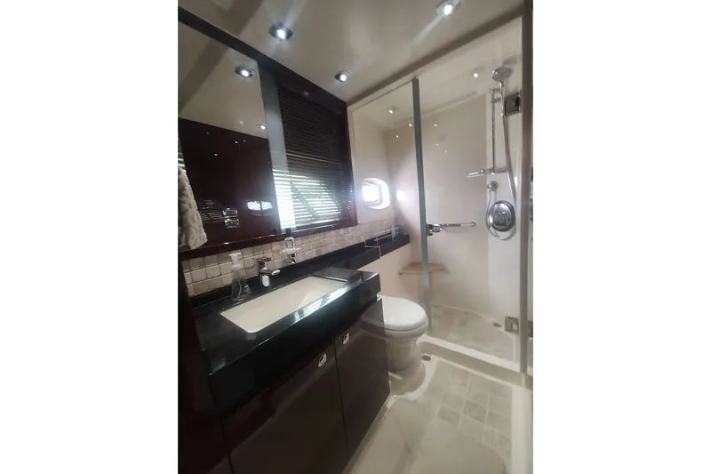 Slide: The Image of Luxurious bathroom in 2010 Sea Ray Sundancer 540 yacht with modern fixtures and shower. - 24