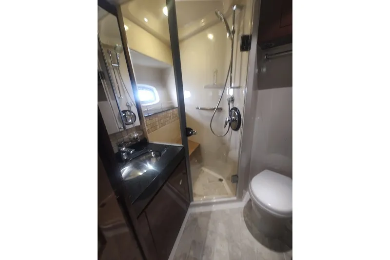 Slide: The Image of Bathroom interior of 2010 Sea Ray Sundancer 540 yacht with shower and sink. - 27
