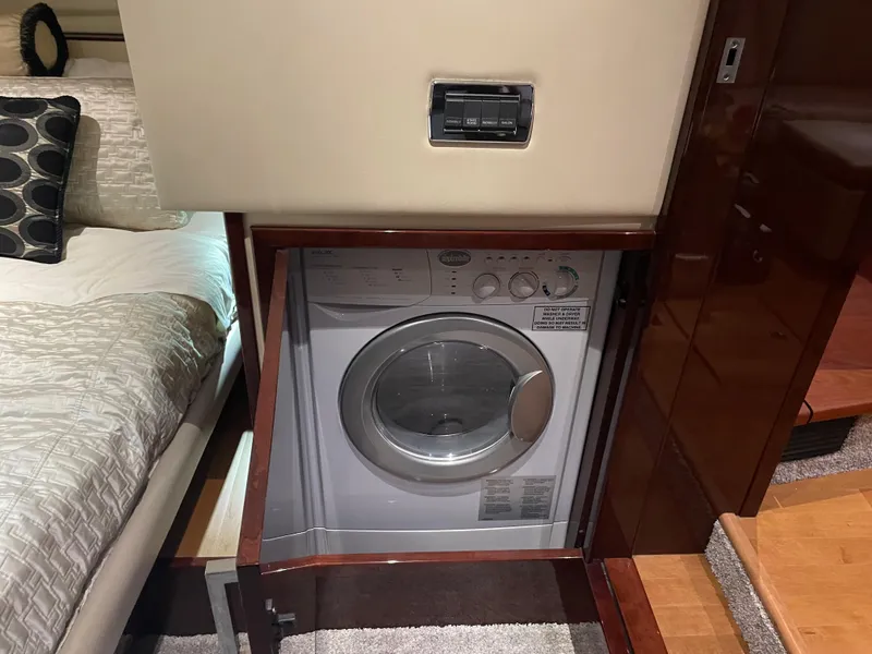 Slide: The Image of Built-in washer in 2010 Sea Ray 540 Sundancer yacht bedroom. - 25