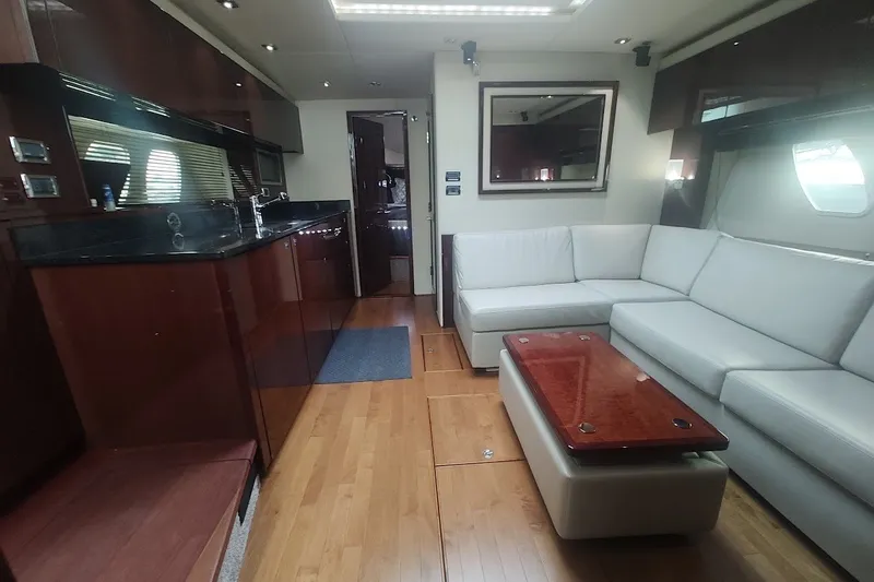 Slide: The Image of Luxurious interior of 2010 Sea Ray Sundancer 540 yacht with modern furnishings and sleek design. - 16