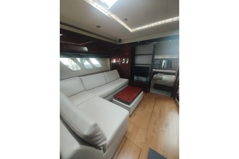 Slide: The Image of Luxurious interior of 2010 Sea Ray Sundancer 540 yacht with elegant seating and modern design. - 18