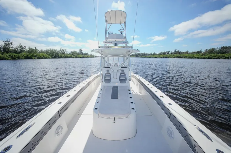 Slide: The Image of 2020 Tideline 365 Offshore boat on calm water under a clear blue sky. - 61