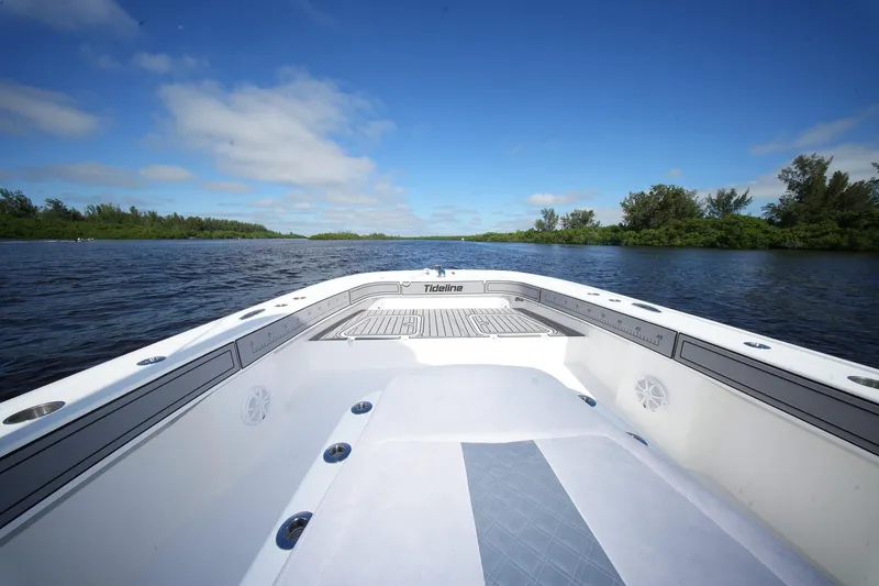Slide: The Image of 2020 Tideline 365 Offshore boat on calm water under blue sky. - 35