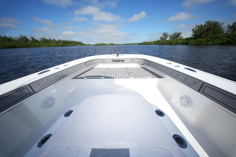 Slide: The Image of 2020 Tideline 365 Offshore boat on calm water under a clear blue sky. - 36
