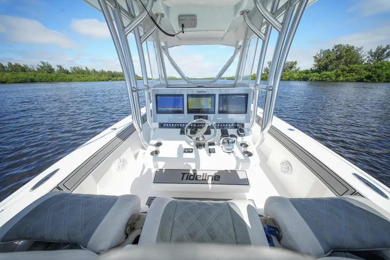 Slide: The Image of Cockpit view of 2020 Tideline 365 Offshore boat with advanced navigation systems. - 45