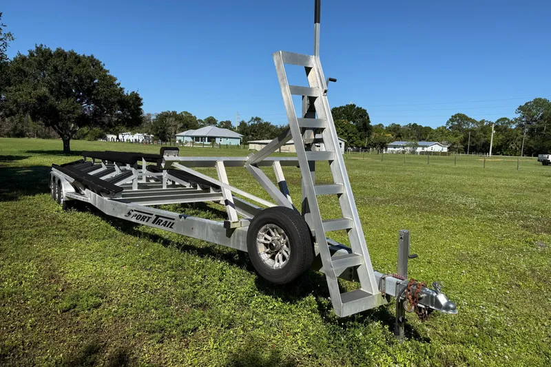 Slide: The Image of Trailer for 2020 Tideline 365 Offshore boat on grassy field. - 91