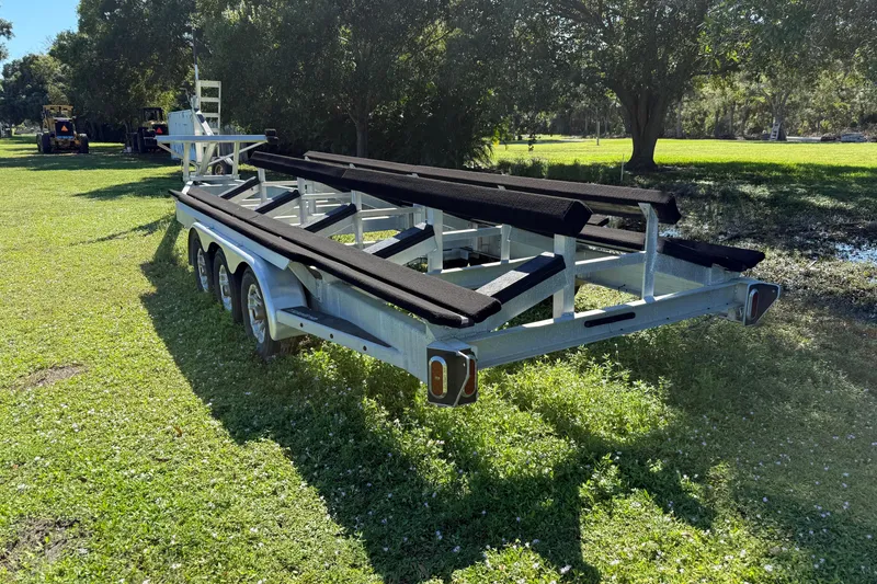 Slide: The Image of Trailer for 2020 Tideline 365 Offshore boat on grassy field. - 89