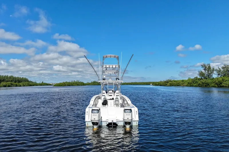 Slide: The Image of 2020 Tideline 365 Offshore boat on calm water under clear blue sky. - 30