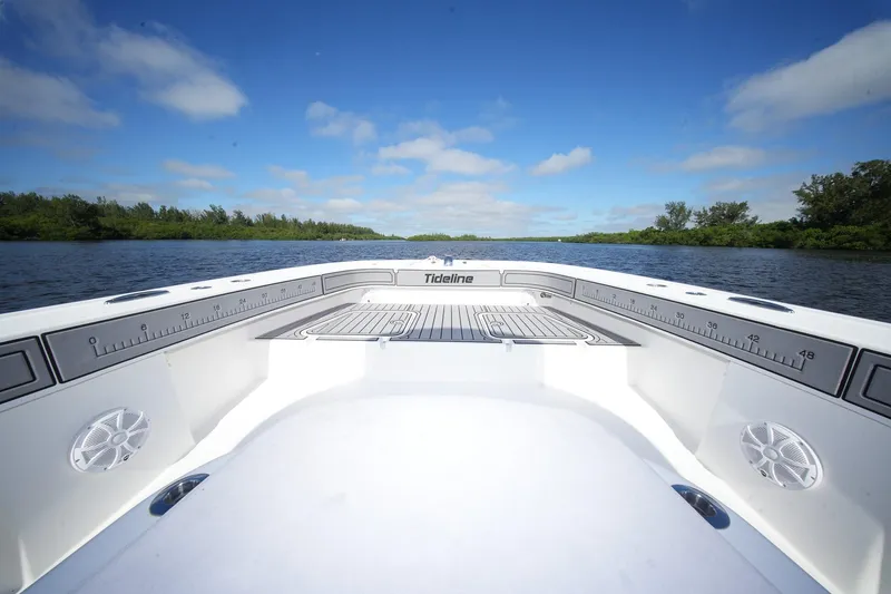 Slide: The Image of 2020 Tideline 365 Offshore boat on calm water under blue sky. - 32