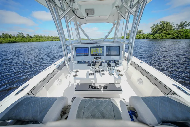 Slide: The Image of Cockpit view of 2020 Tideline 365 Offshore boat with advanced navigation systems. - 46