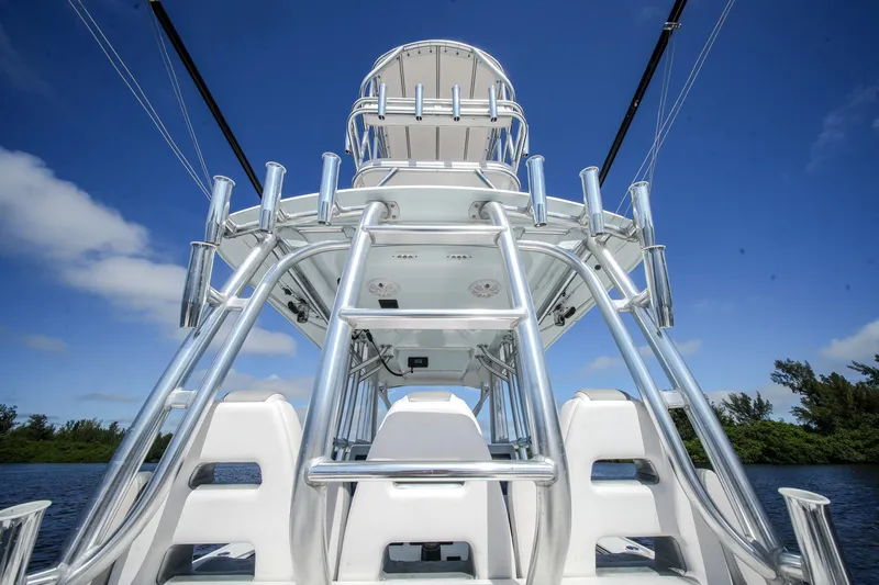 Slide: The Image of 2020 Tideline 365 Offshore boat with tower against blue sky backdrop. - 71