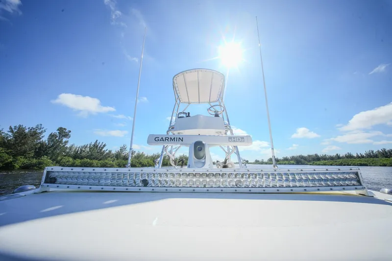 Slide: The Image of 2020 Tideline 365 Offshore boat with Garmin equipment under a bright blue sky. - 78