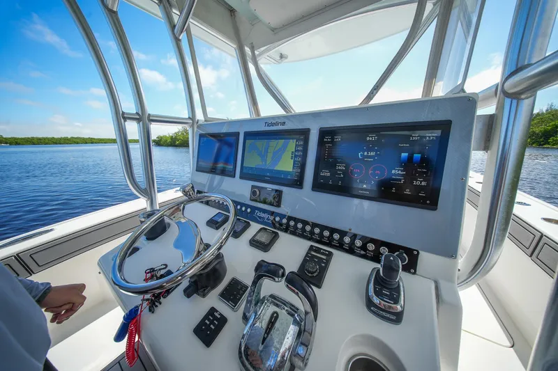 Slide: The Image of Helm of 2020 Tideline 365 Offshore boat with advanced navigation displays. - 42