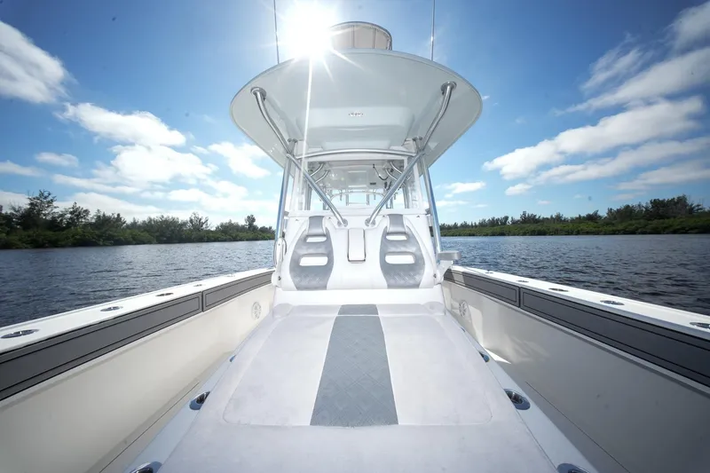 Slide: The Image of 2020 Tideline 365 Offshore boat on a sunny day, with clear blue skies and calm waters. - 62