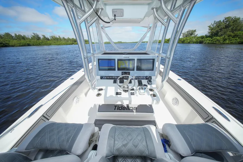 Slide: The Image of Cockpit view of 2020 Tideline 365 Offshore boat with advanced navigation system. - 44