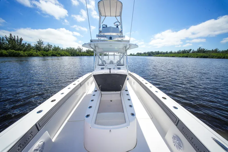 Slide: The Image of 2020 Tideline 365 Offshore boat on calm water under a clear blue sky. - 75