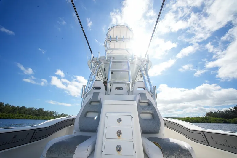 Slide: The Image of 2020 Tideline 365 Offshore boat under bright blue sky and sunlight. - 83