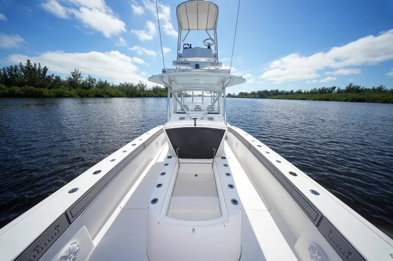 Slide: The Image of 2020 Tideline 365 Offshore boat on calm water under a clear blue sky. - 76