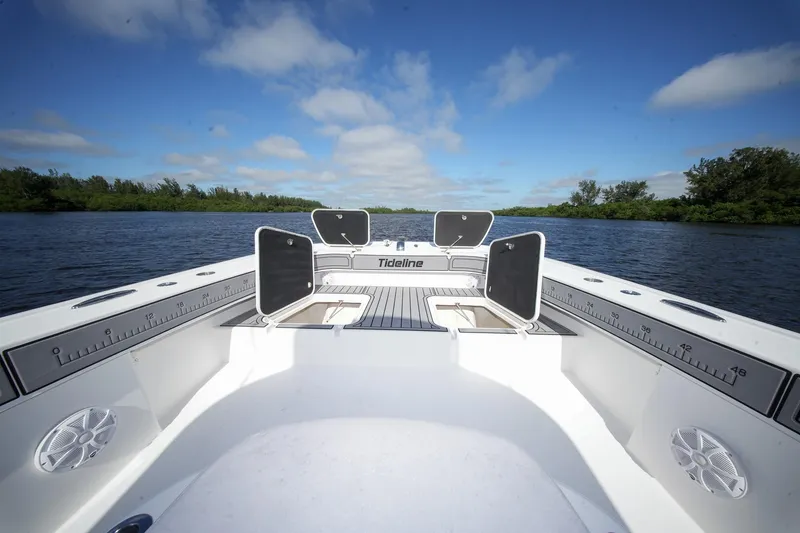 Slide: The Image of 2020 Tideline 365 Offshore boat on calm water under blue sky. - 56