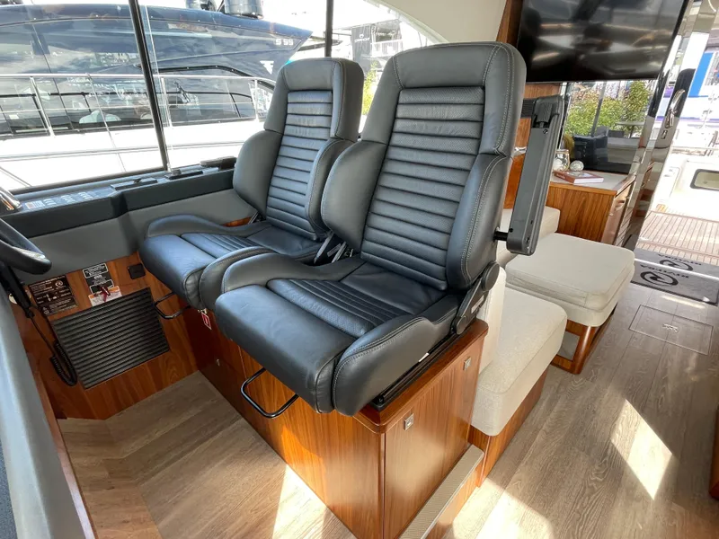 Slide: The Image of Luxurious interior of 2022 Riviera 505 SUV with leather seating and modern design. - 25