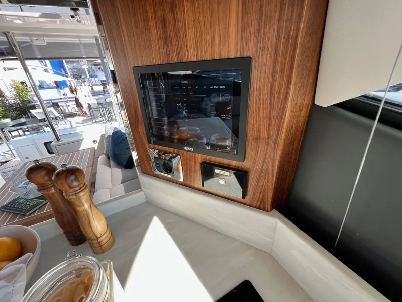 Slide: The Image of Luxurious interior of 2022 Riviera 505 SUV yacht with modern kitchen amenities. - 19