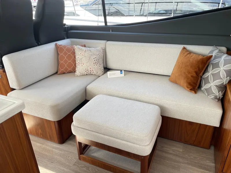 Slide: The Image of Luxurious 2022 Riviera 505 SUV interior with elegant seating and stylish cushions. - 24