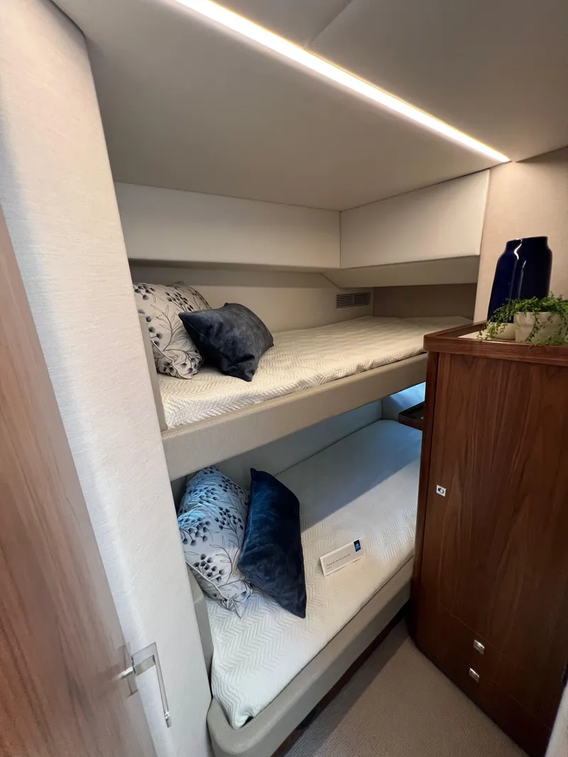 Slide: The Image of 2022 Riviera 505 SUV interior with cozy bunk beds and modern design. - 33