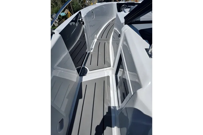 Slide: The Image of 2025 Grandfort 300 GTS boat interior with sleek gray flooring and modern design. - 24
