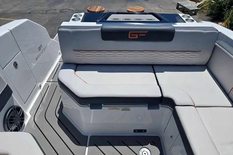 Slide: The Image of Luxury seating area on a 2025 Grandfort 300 GTS boat, featuring sleek design and modern amenities. - 17