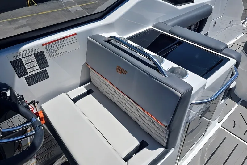 Slide: The Image of Interior of 2025 Grandfort 300 GTS boat with sleek seating and modern design. - 22